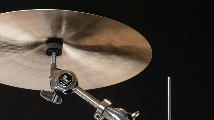 A close up of a drum set on a black background